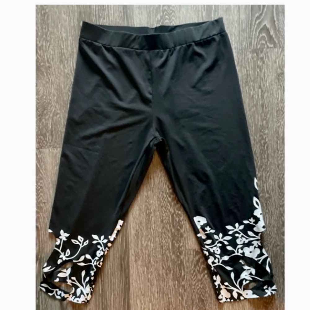 WORN ONCE! SUPER CUTE CAPRI PANTS WITH FLORAL HEM AND HOLE ACCENTS! - Picture 1 of 9